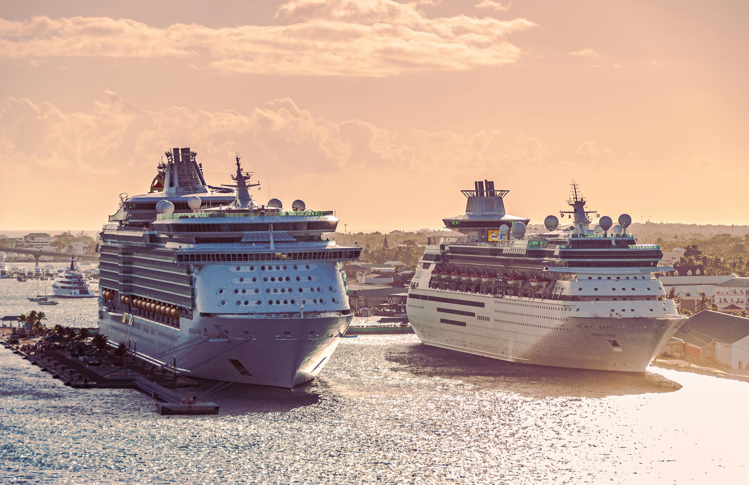 Cruise ship sailing at sunset