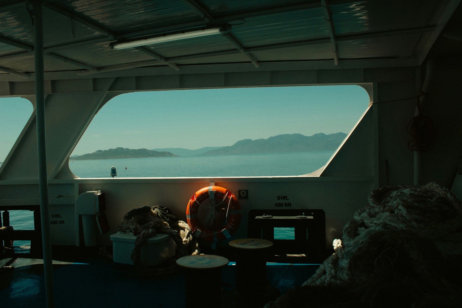 Sea and islands viewed from a ship cabin window