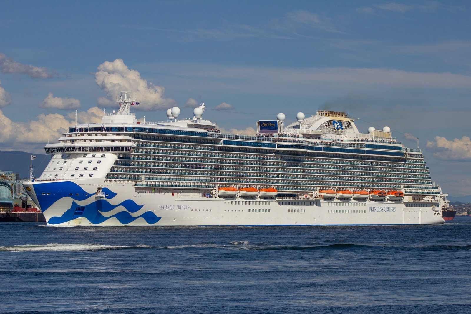 Cruise ship sailing on a clear blue sea