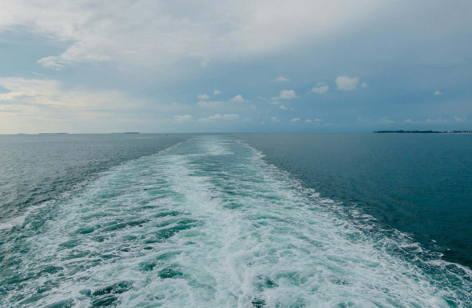 Wake trailing behind a ship at sea