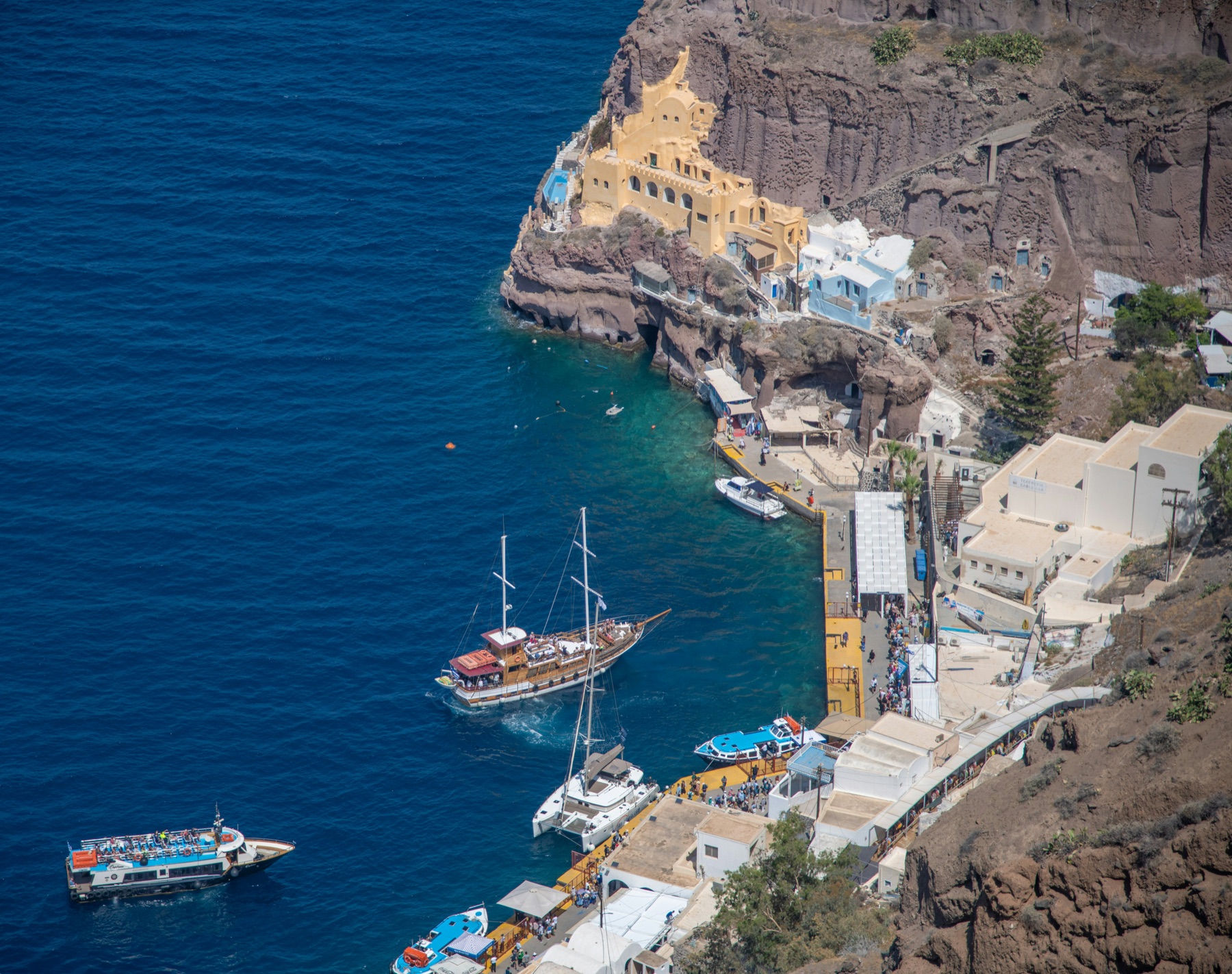 Boats and buildings beside the sea in Santorini